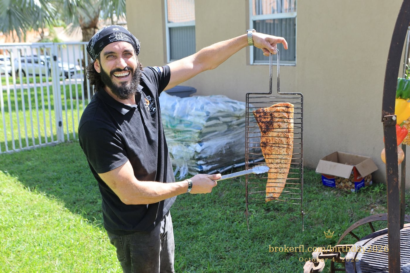 Barbecue cook preparing food for the celebration — Karina Leal's birthday, October 4, 2026.