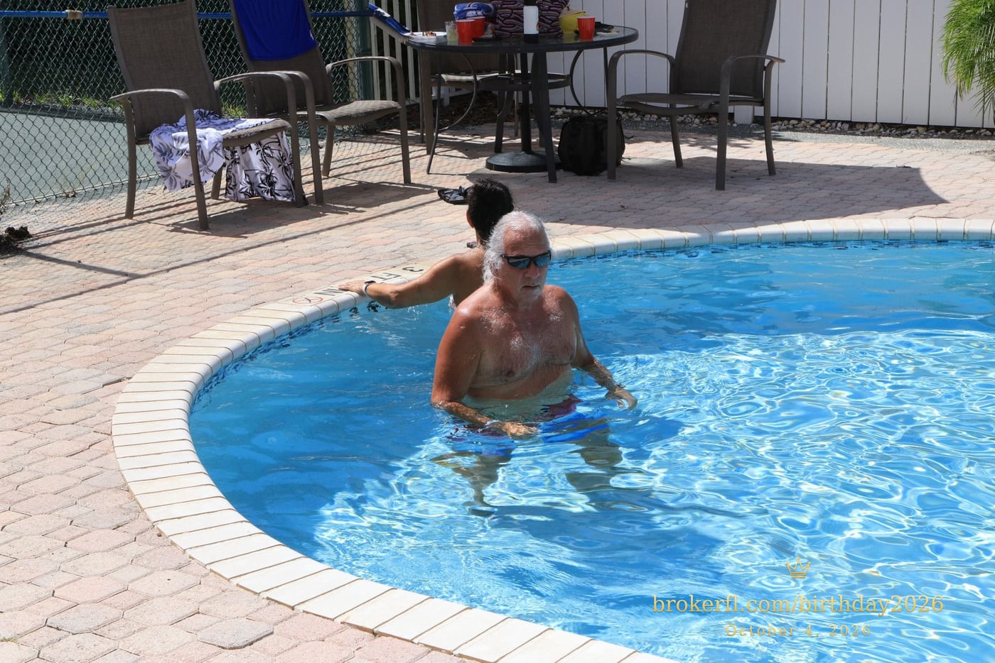 Guests enjoying the water at the edge of the swimming pool — Karina Leal's birthday, October 4, 2026.