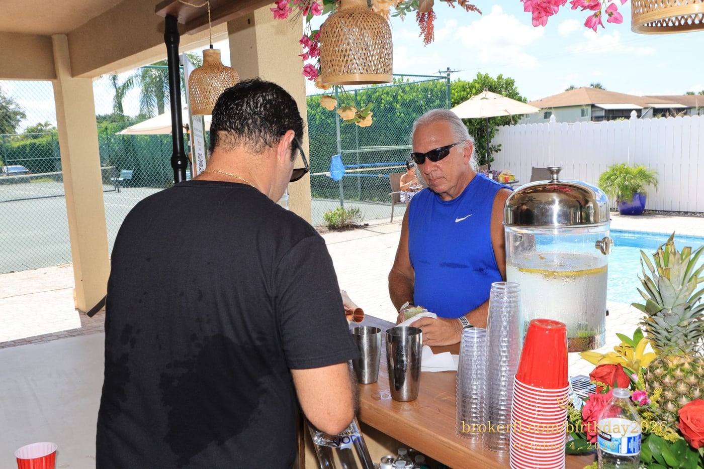 Guests at the party drinks counter — Karina Leal's birthday, October 4, 2026.