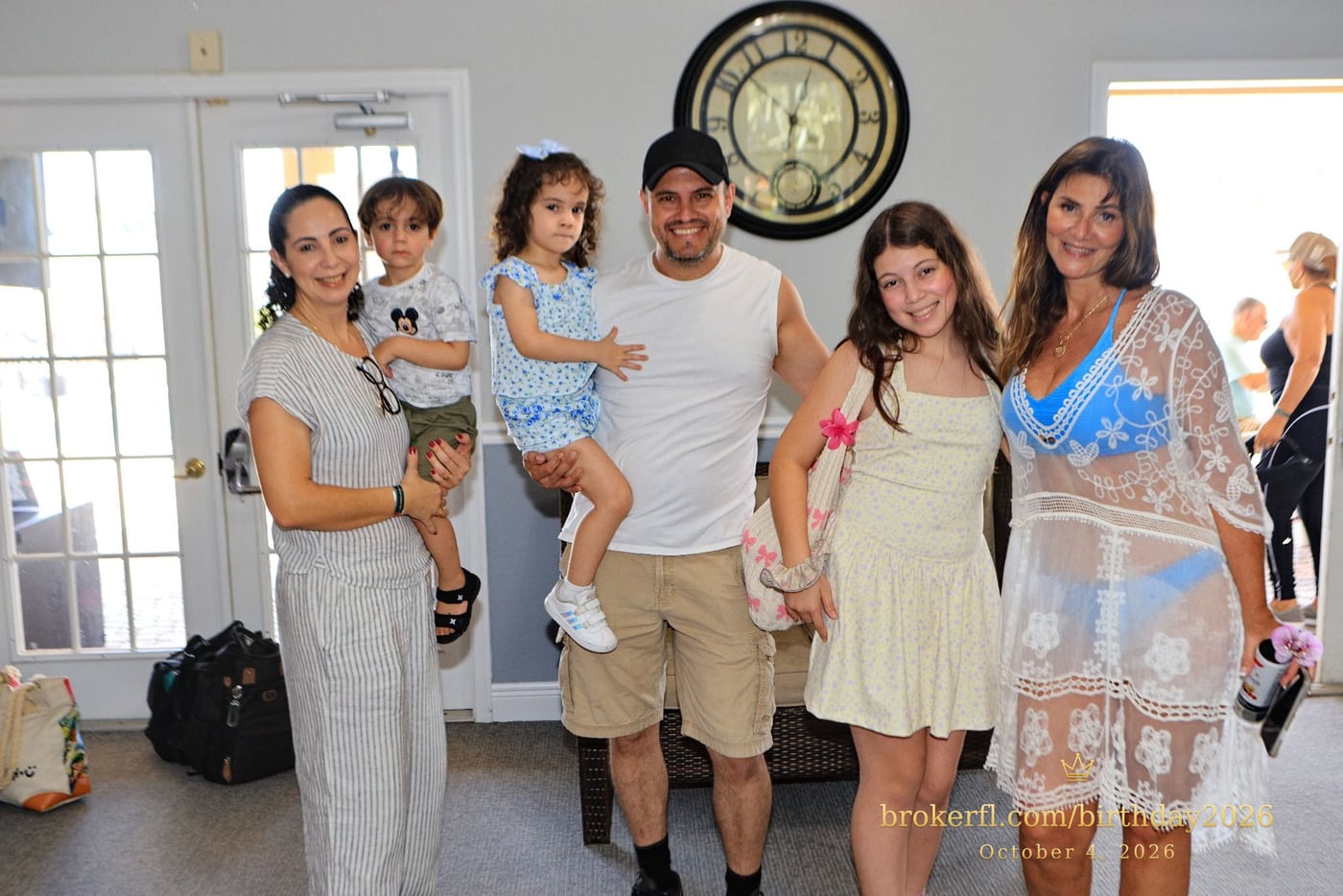 Guests posing together inside the birthday party room — Karina Leal's birthday, October 4, 2026.