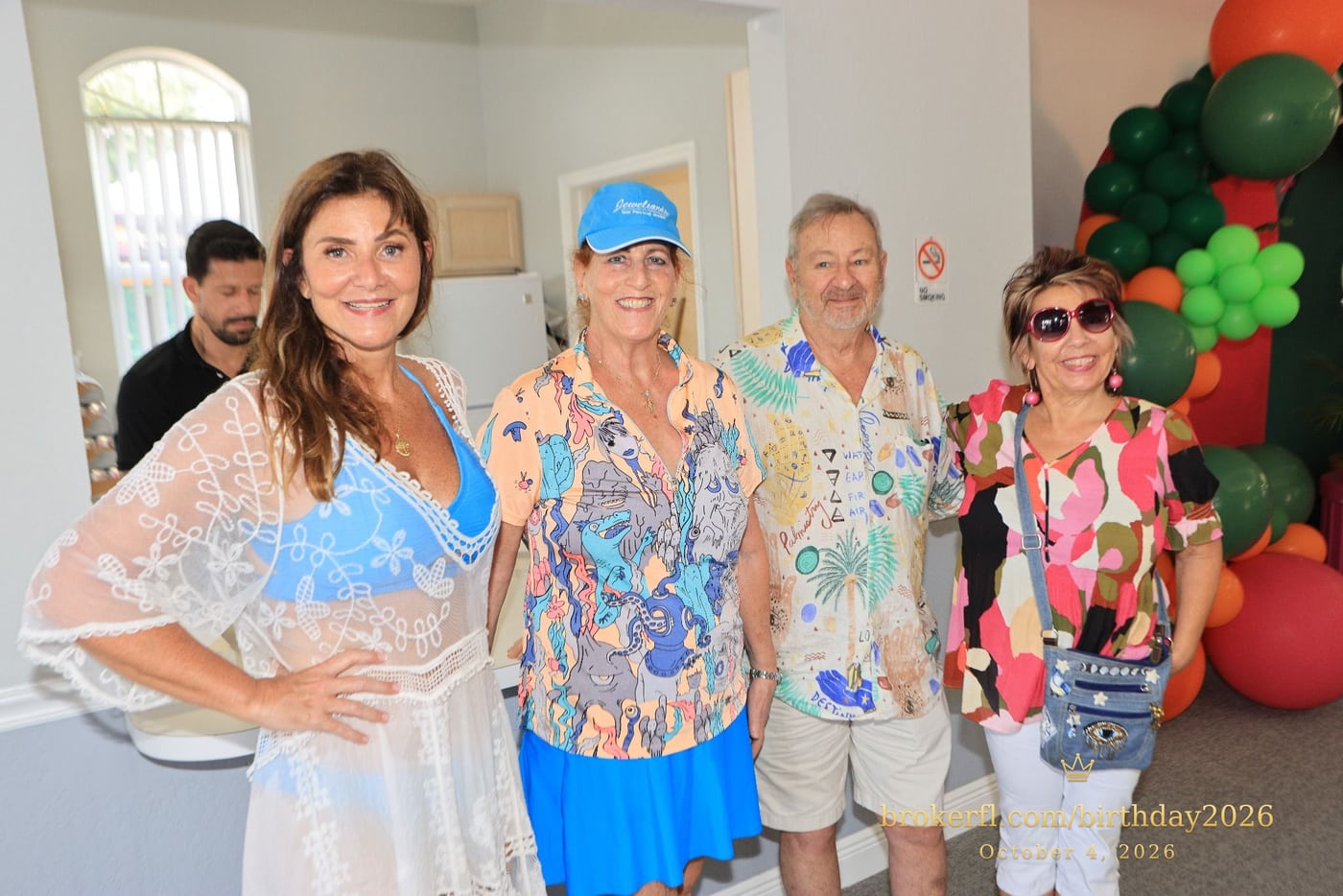 Karina Kfuri Leal with Neildes Esteves, wearing a black floral dress, at Karina’s birthday celebration at Palm Beach Bath & Tennis in Delray Beach.