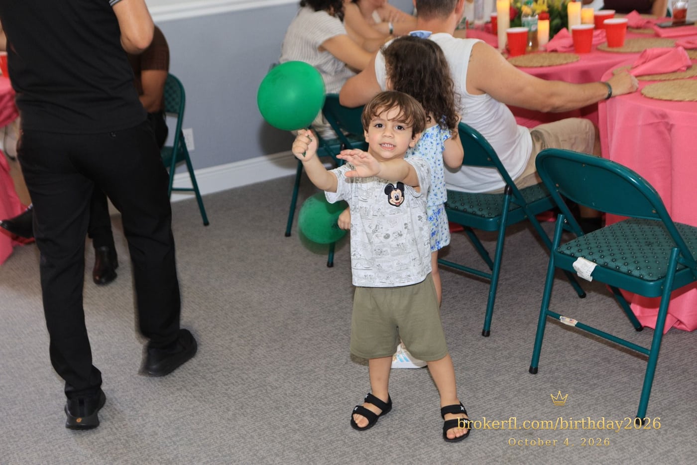 Young guest standing beside the party chairs — Karina Leal's birthday, October 4, 2026.
