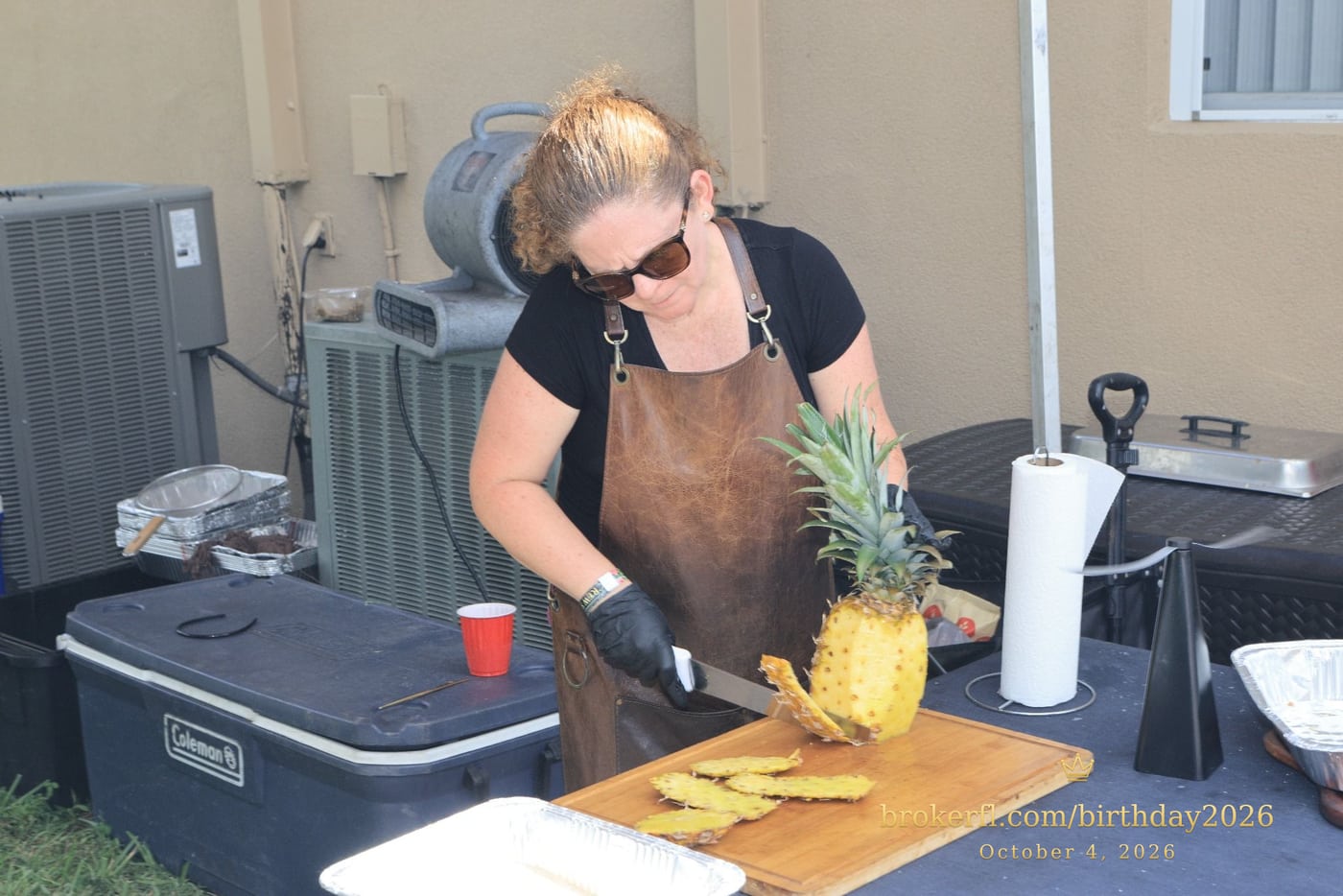 Fruit being prepared at the outdoor serving station — Karina Leal's birthday, October 4, 2026.