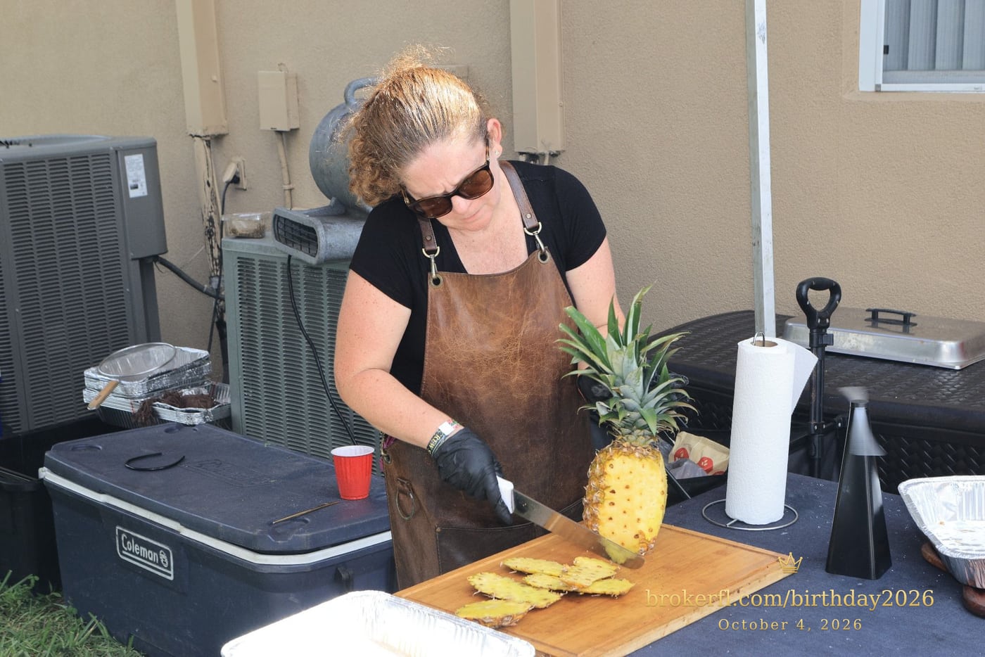 Fruit being prepared at the outdoor serving station — Karina Leal's birthday, October 4, 2026.