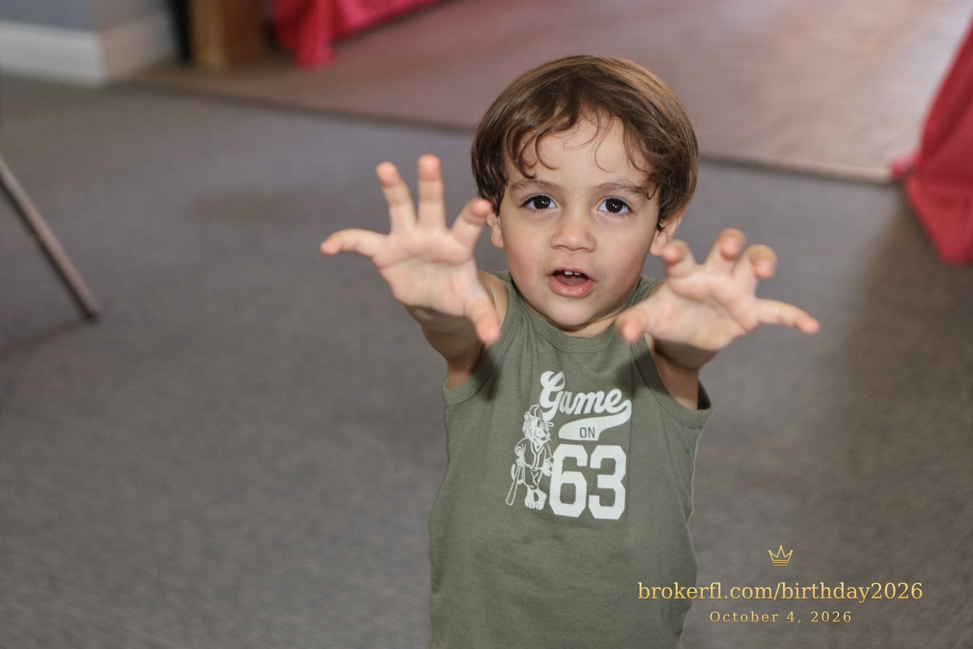 Young guest reaching toward the camera inside the party room — Karina Leal's birthday, October 4, 2026.