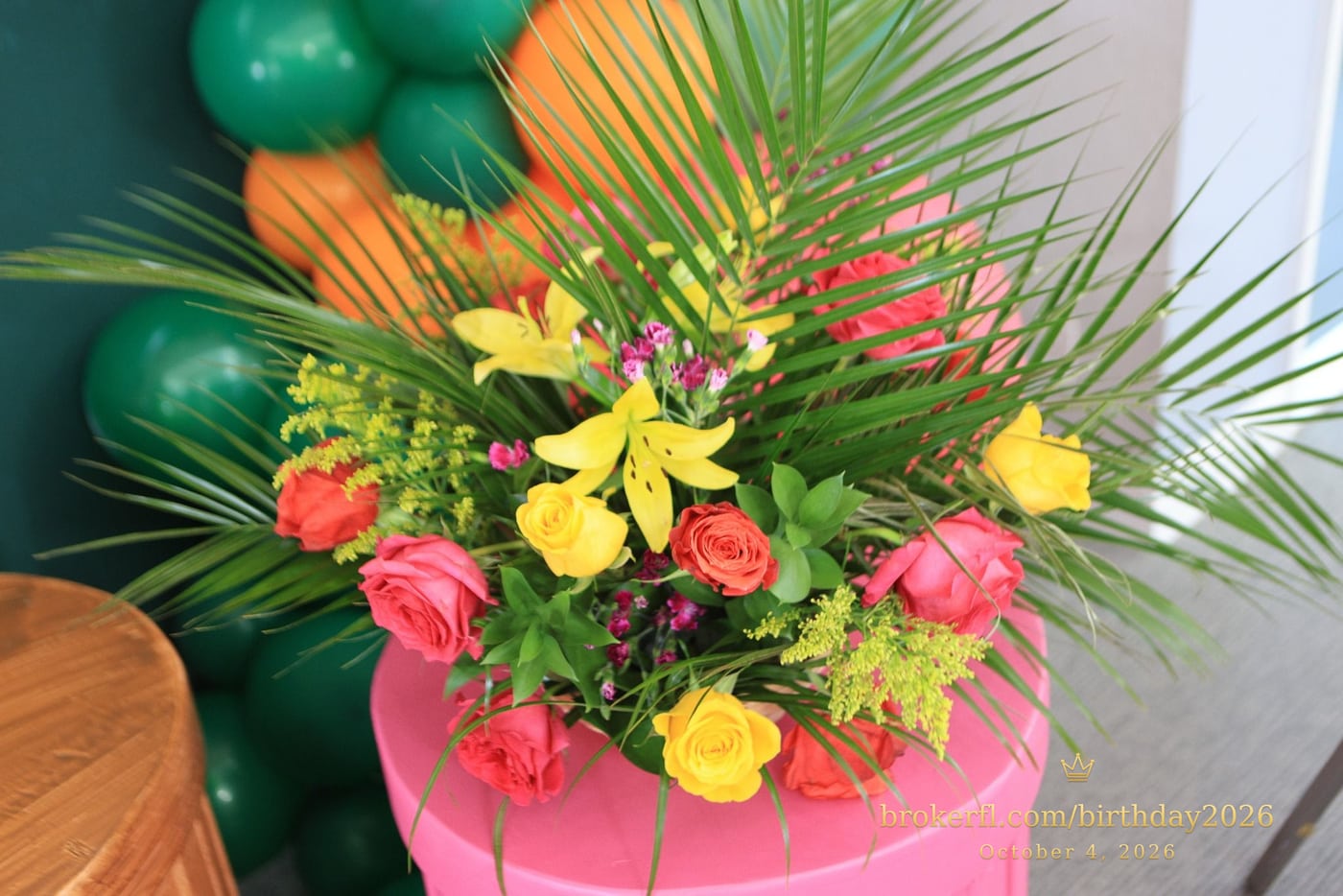 Tropical flower arrangement with pink, yellow and green accents — Karina Leal's birthday, October 4, 2026.