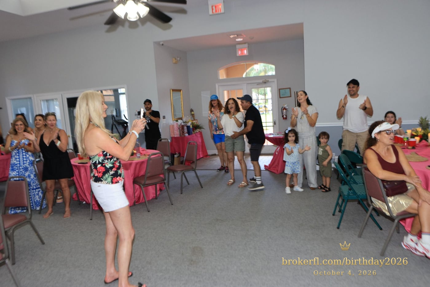 Guests gathered in the party room for the birthday celebration — Karina Leal's birthday, October 4, 2026.