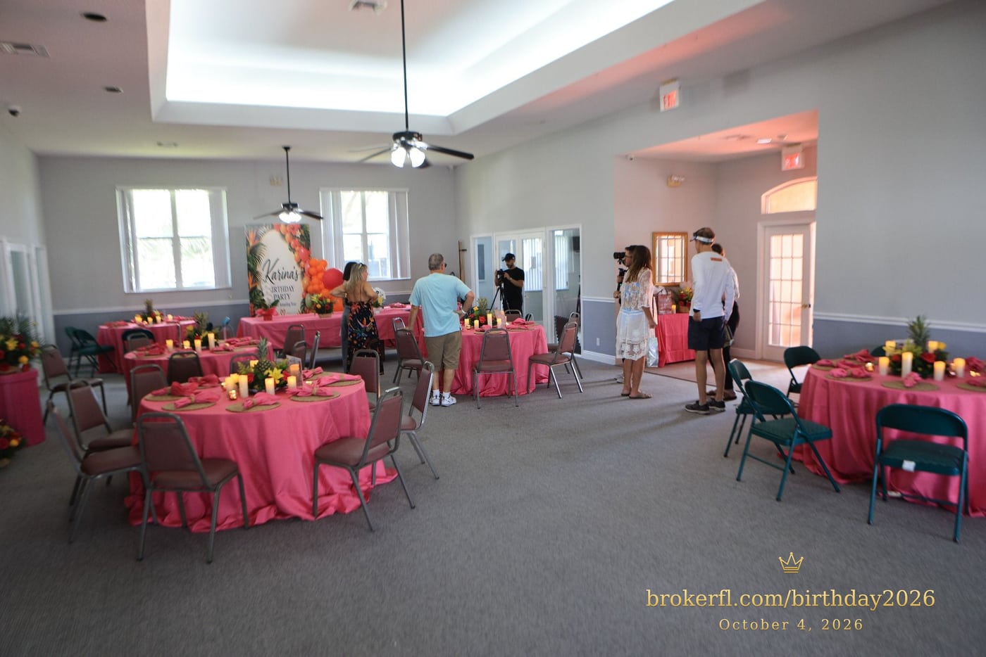 Party room with pink tablecloths and tropical decorations — Karina Leal's birthday, October 4, 2026.
