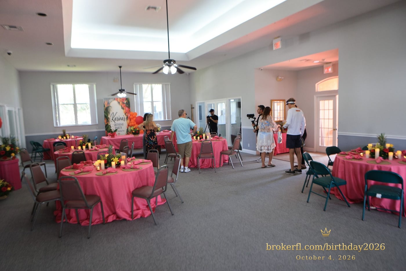 Party room with pink tablecloths and tropical decorations — Karina Leal's birthday, October 4, 2026.