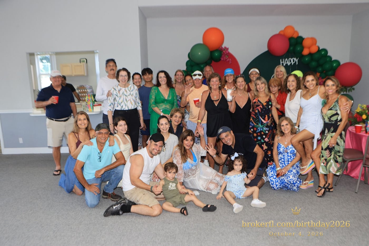 Large group portrait of the birthday celebration guests — Karina Leal's birthday, October 4, 2026.