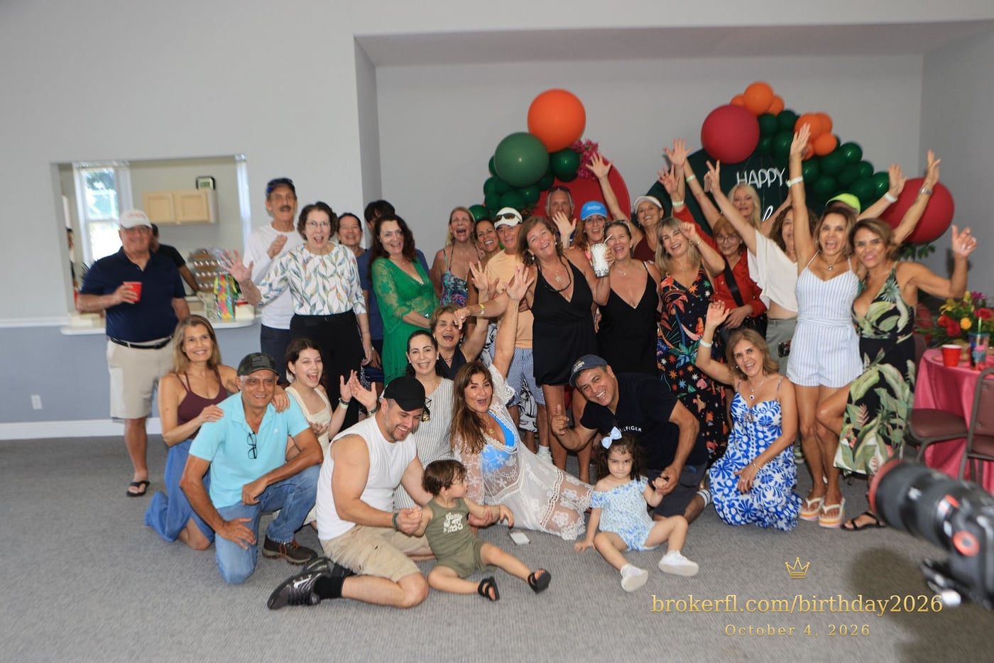 Large group portrait of the birthday celebration guests — Karina Leal's birthday, October 4, 2026.