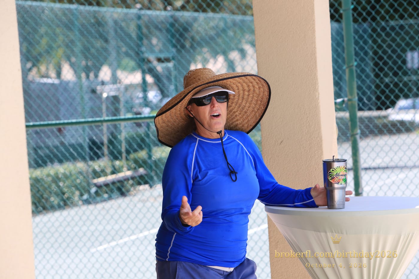 Joe “Wags” Wagenhals, the lifeguard, in blue with a wide-brimmed hat at Karina’s birthday celebration.