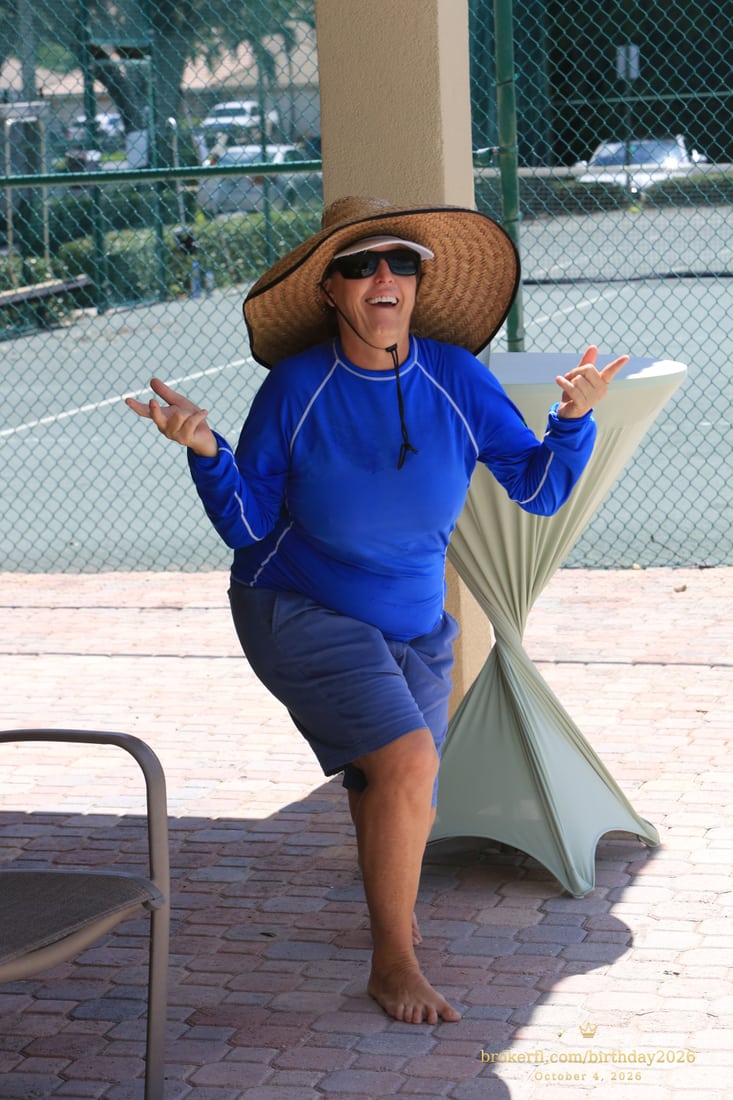 Joe “Wags” Wagenhals, the lifeguard, in blue with a wide-brimmed hat at Karina’s birthday celebration.