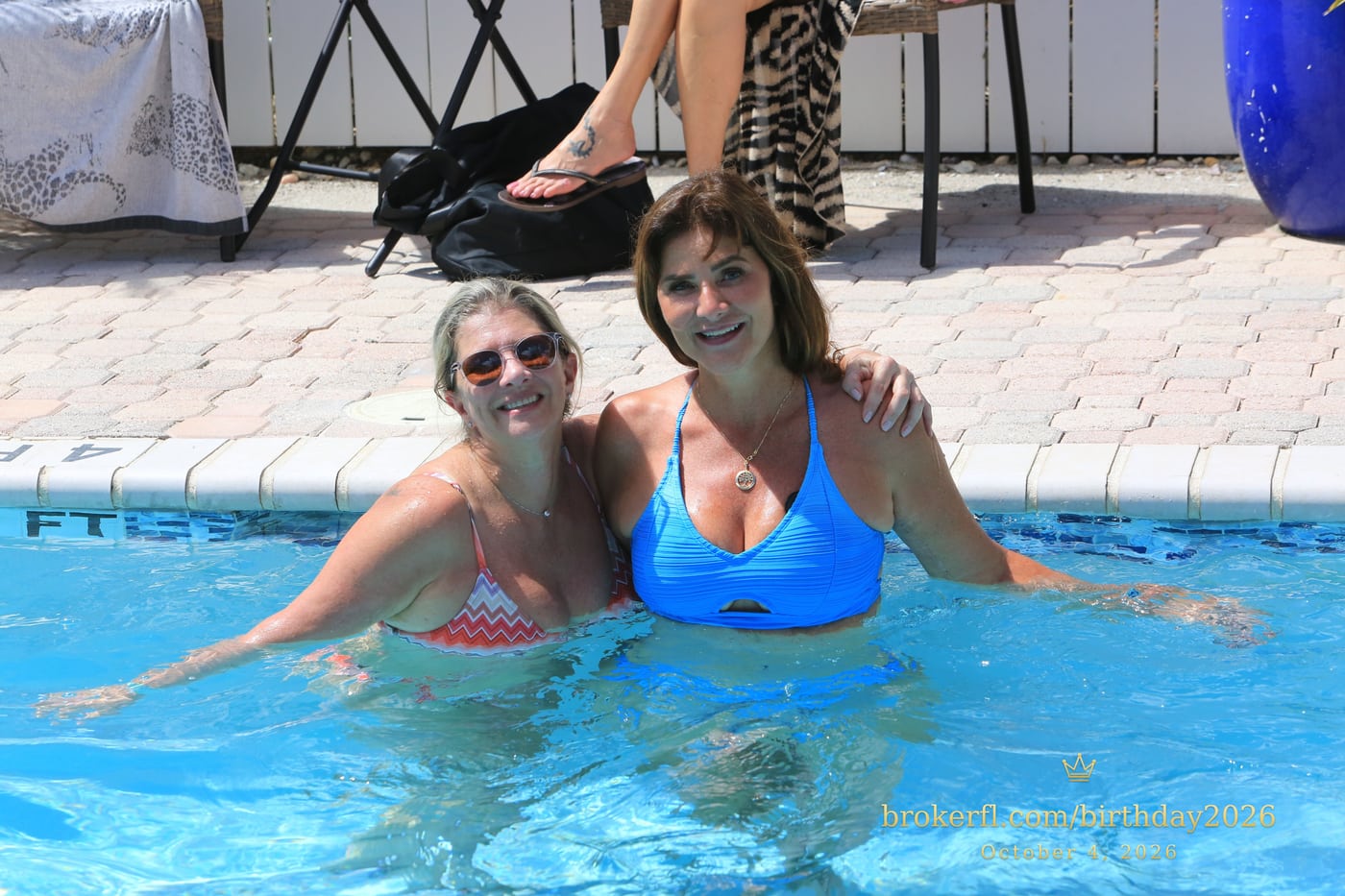 Two friends enjoying a moment together in the swimming pool — Karina Leal's birthday, October 4, 2026.