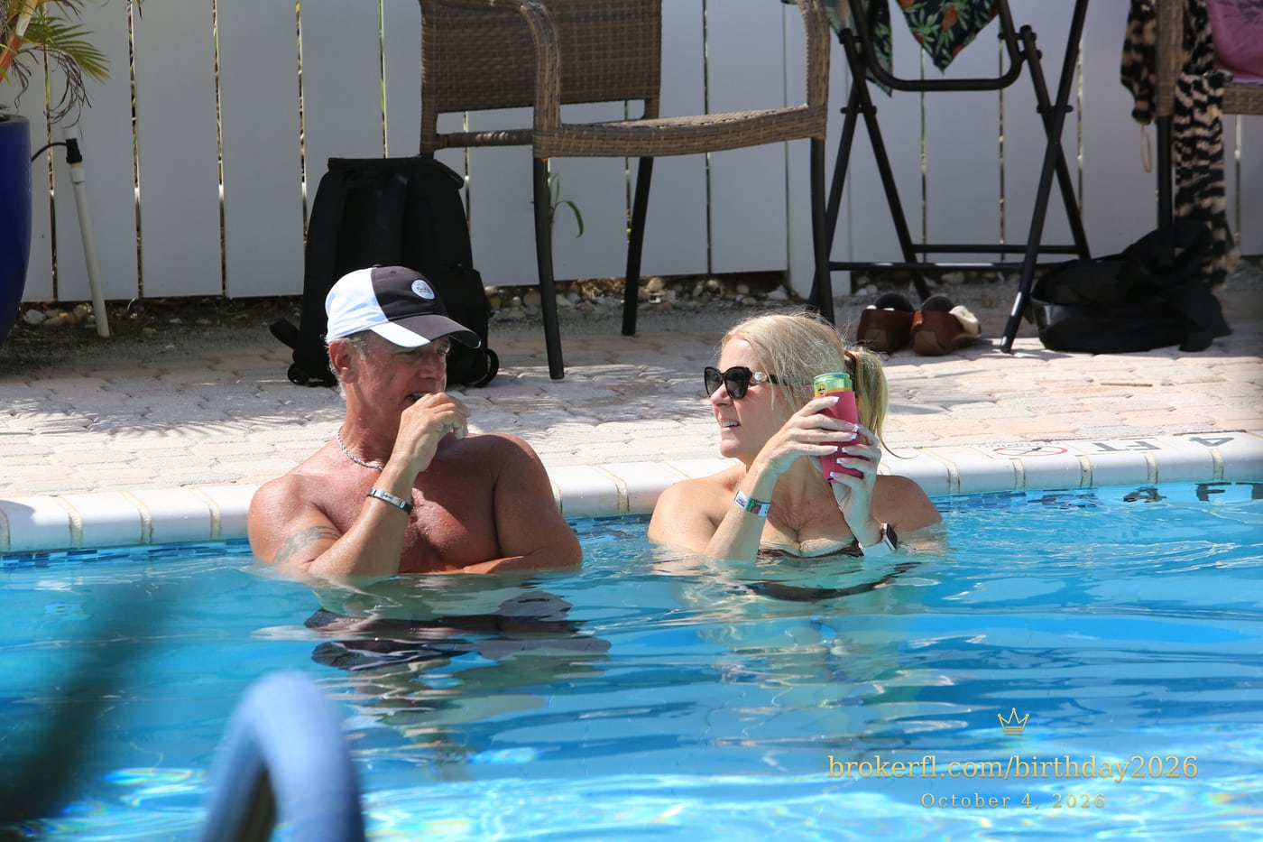 Guests chatting in the swimming pool — Karina Leal's birthday, October 4, 2026.