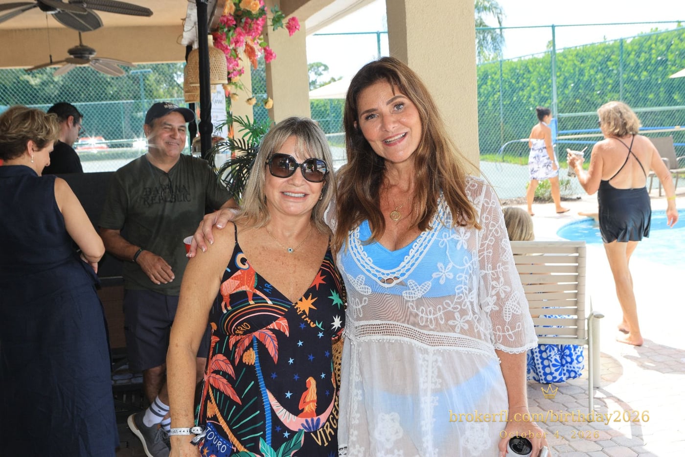 Two guests posing together at the birthday celebration — Karina Leal's birthday, October 4, 2026.