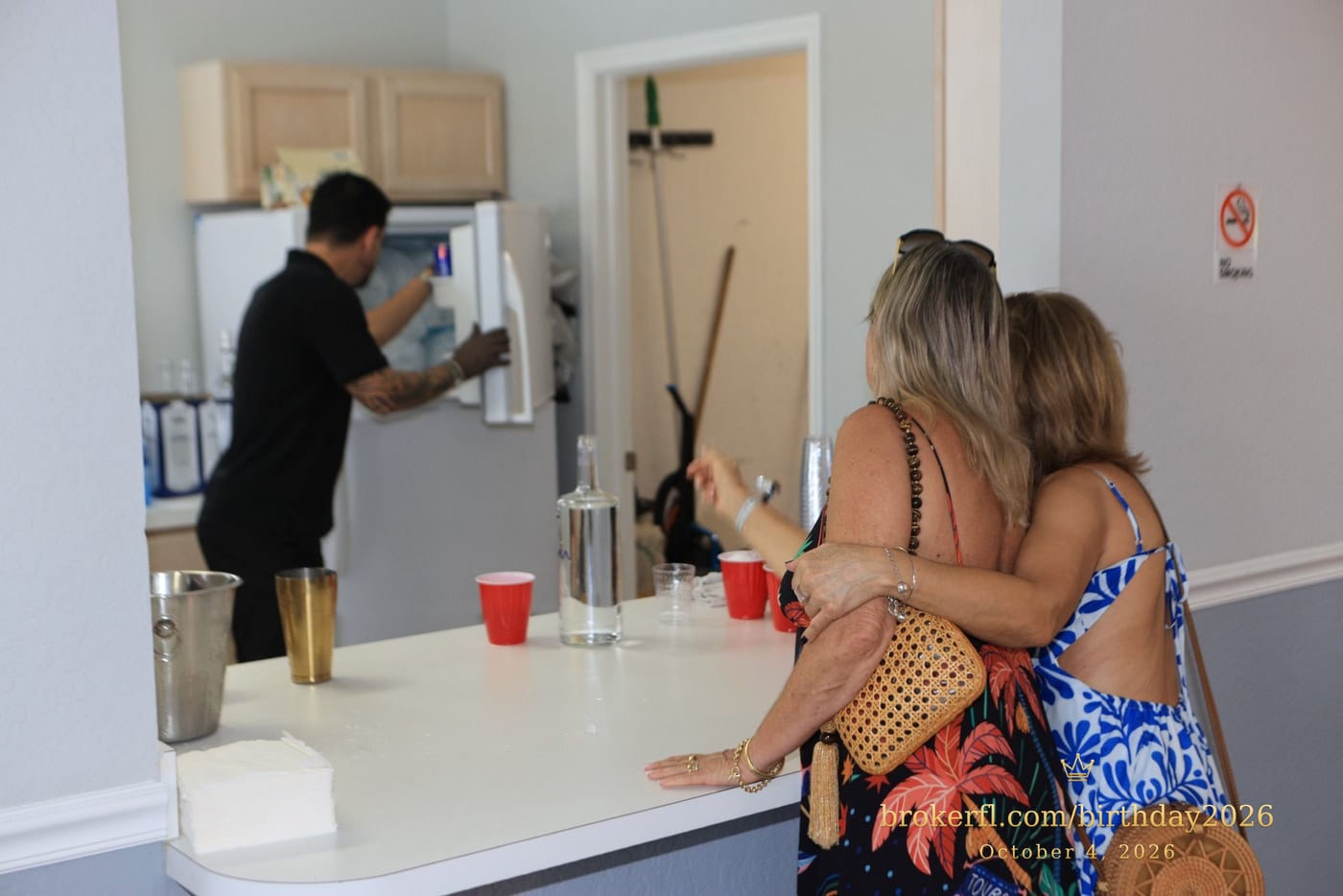 Guests at the party drinks counter — Karina Leal's birthday, October 4, 2026.